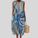 Blaues Kleid mit Krakenmotiv