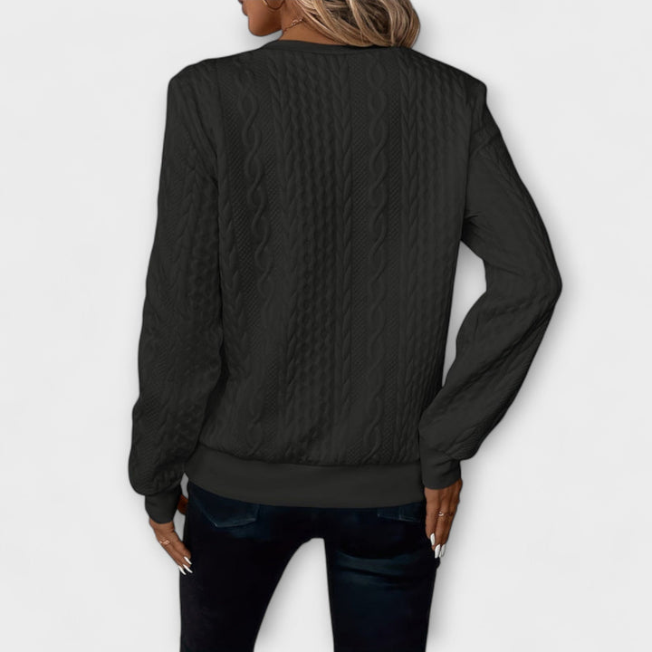 Joy - Pull en tricot blanc élégant à motif torsadé