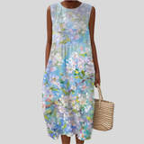 Weisses Kleid mit pastellfarbenen Blüten