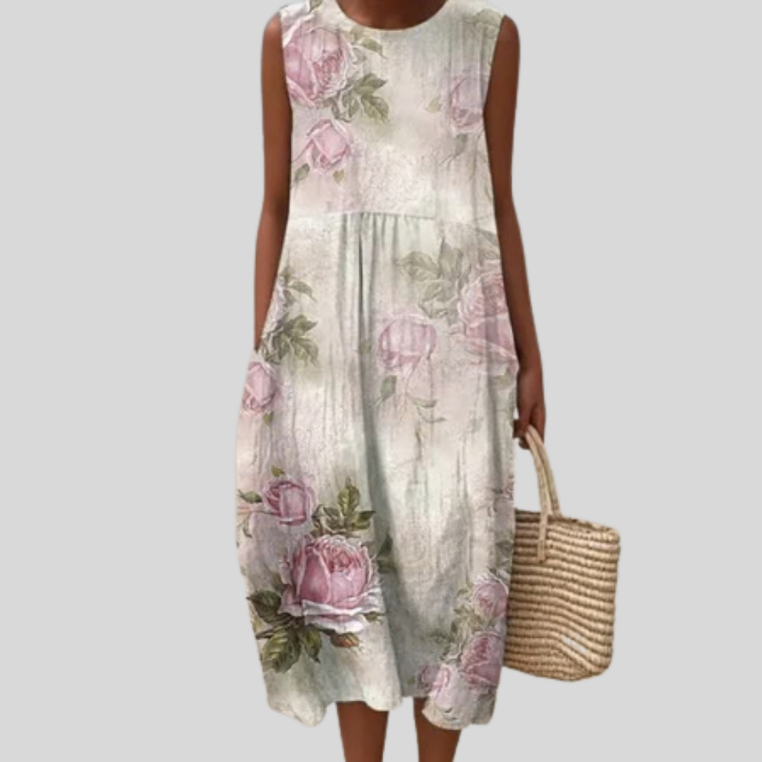 Abito color crema con motivo a rose