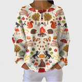 Das Alma | Cremefarbener Pullover mit herbstlichem Waldmotiv