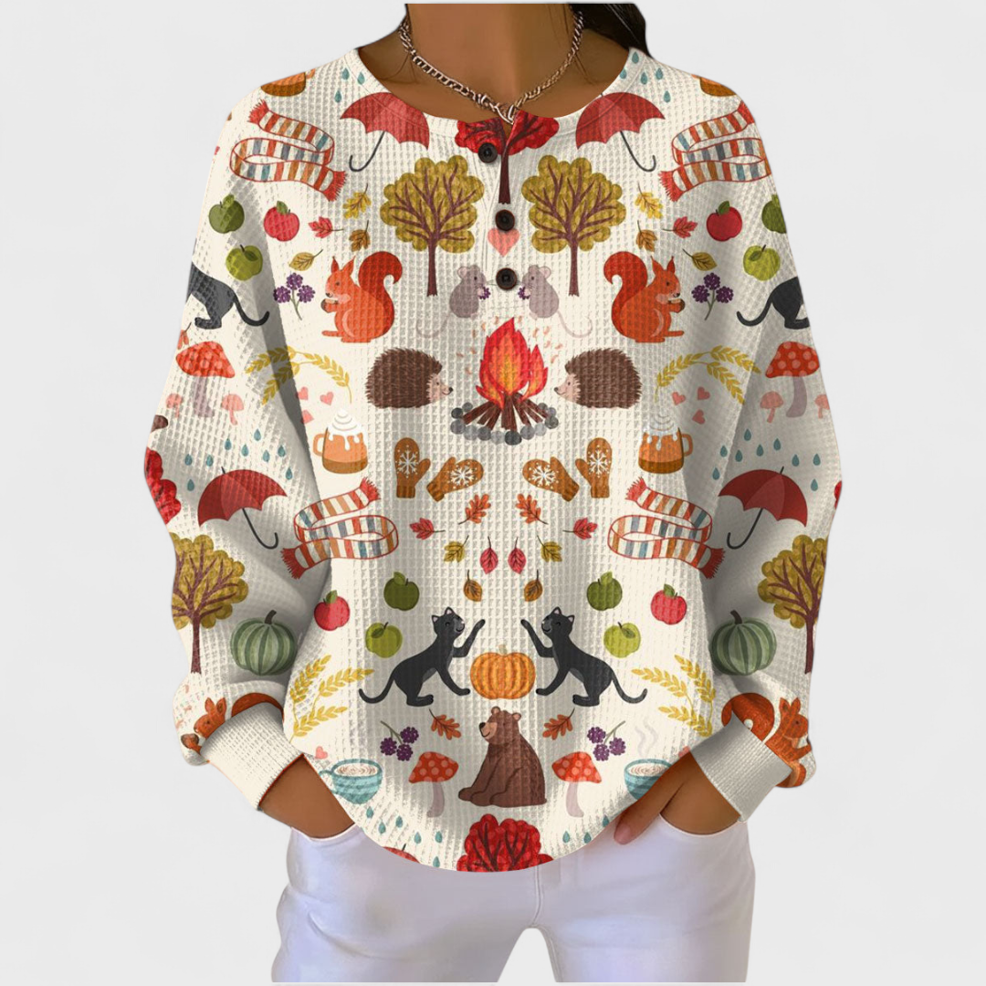 L'Alma | Pull couleur crème avec motif forestier automnal