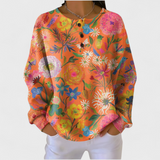 Faustine | Oranger Pullover mit buntem Blumenmuster