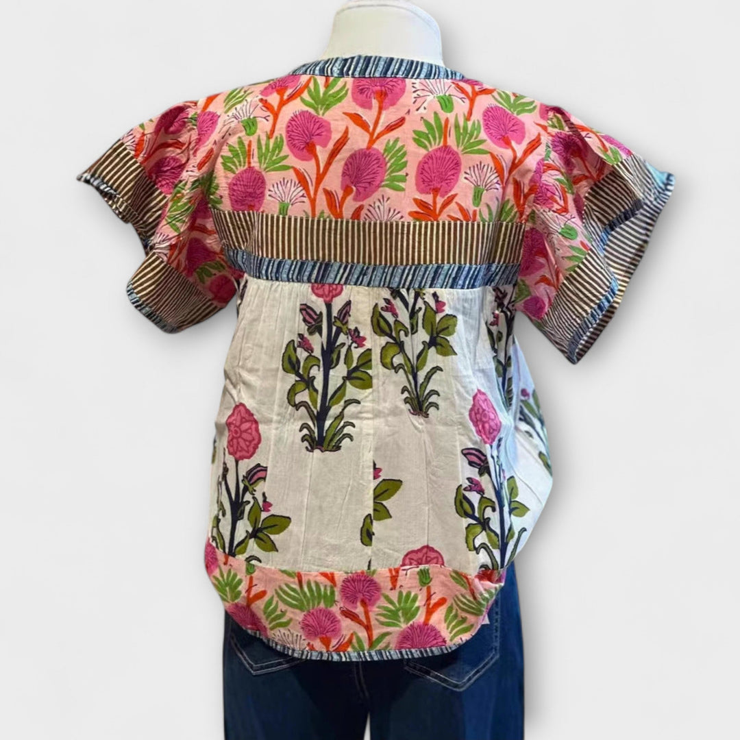 Uriella - Camicetta boho bianca con ricami floreali