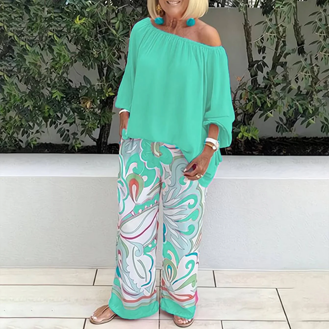 Yesenia - Completo blu con top a spalle scoperte