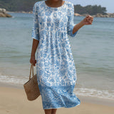 Sofia - Blau-weisses Maxikleid mit Ornamentmuster