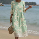 Gabi - Mintgrünes Midi-Kleid mit Blütenstickerei