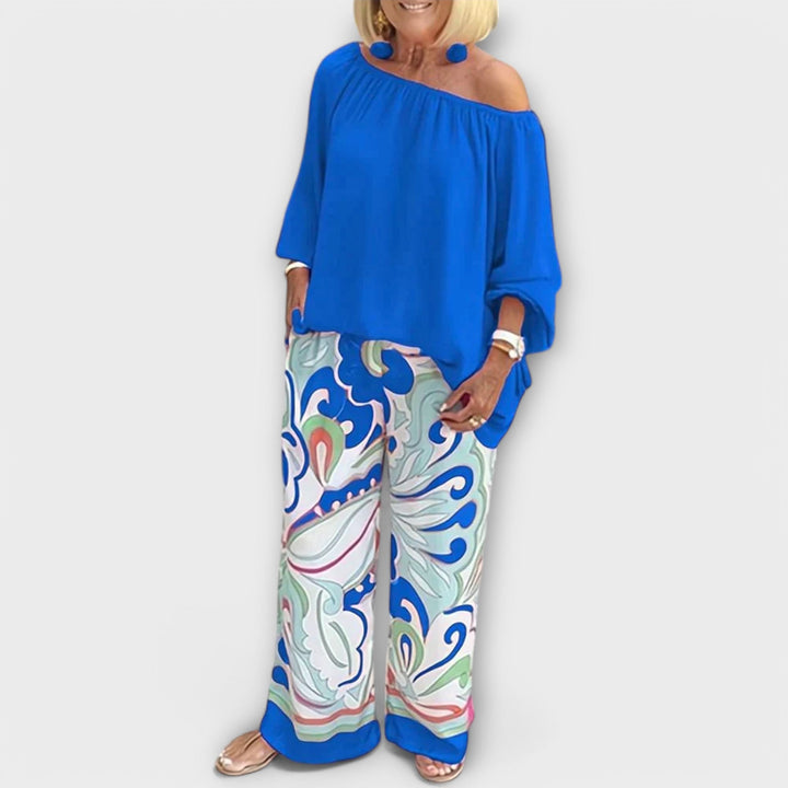 Yesenia - Completo blu con top a spalle scoperte