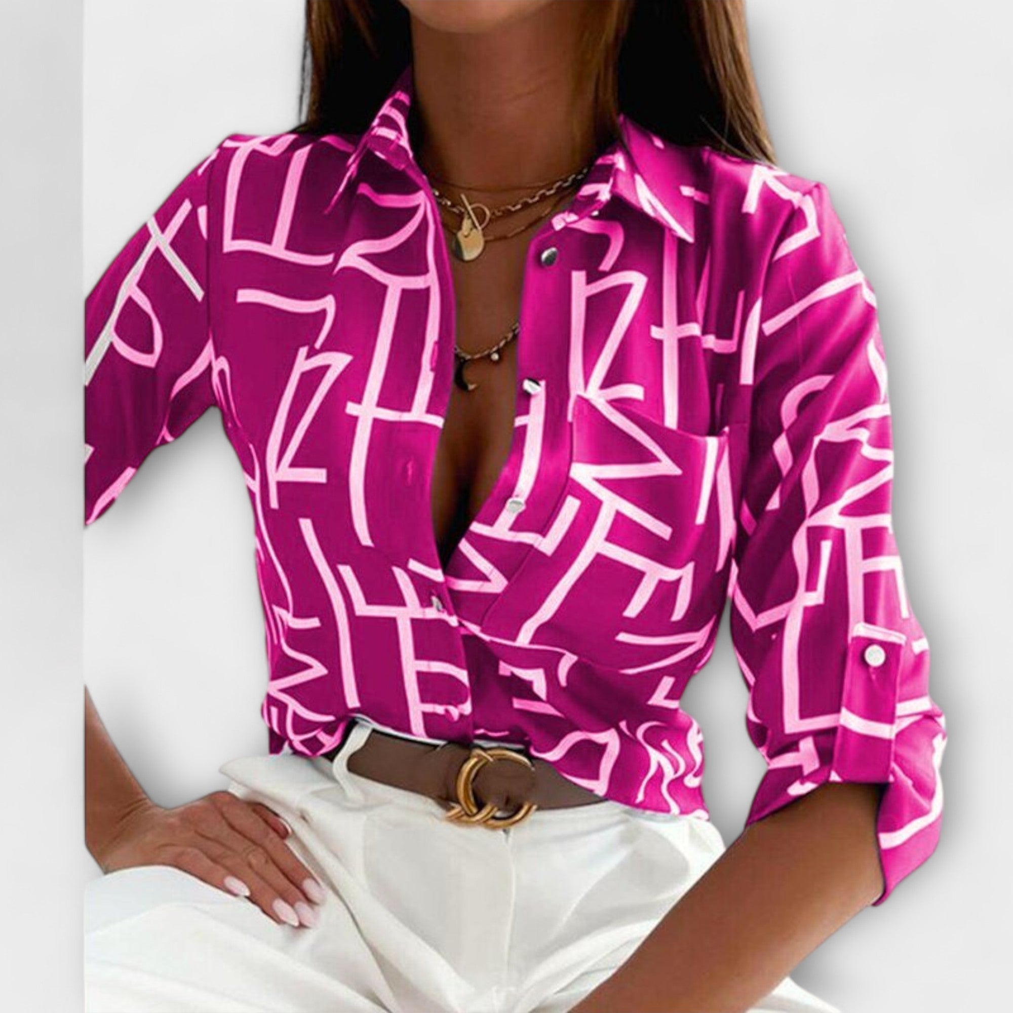 Blaue Bluse mit grafischem Muster und Kragen